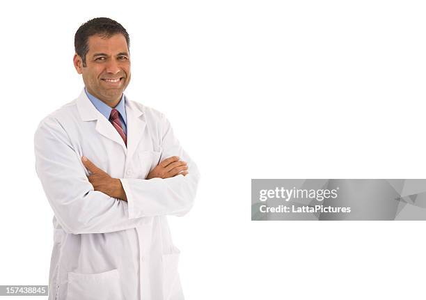 smiling mid adult male wearing lab coat with arms crossed - doctor with arms crossed stock pictures, royalty-free photos & images