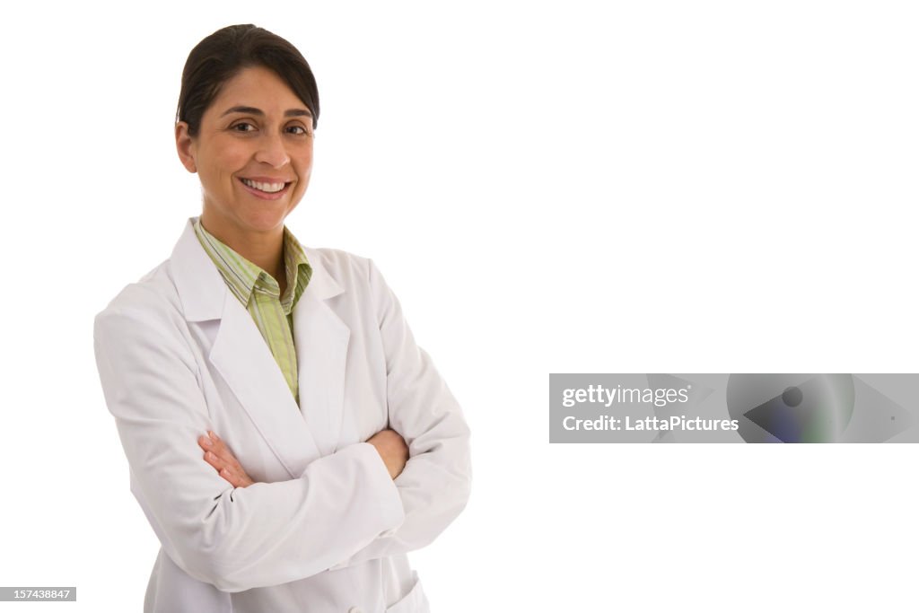 Smiling mid adult woman wearing lab coat arms crossed