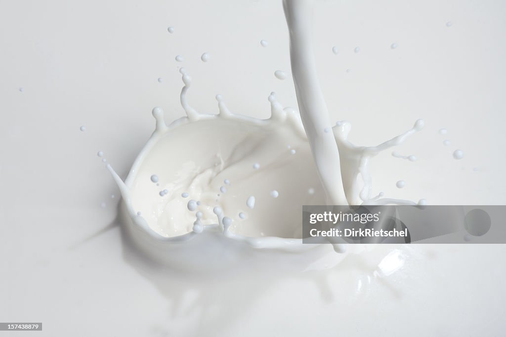 Pouring milk.