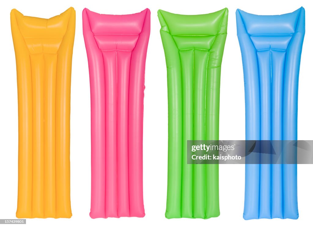 Colorful air mattresses in a row