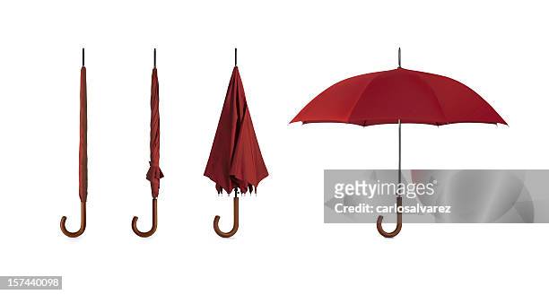 four pictures of umbrellas in different positions - paraplu stockfoto's en -beelden