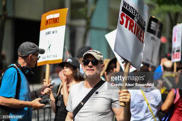 Christian Slater joins Writers Guild of America East to walk the picket line on day 87 during a ‘comedy writers rally’ outside of NBC Rockefeller...