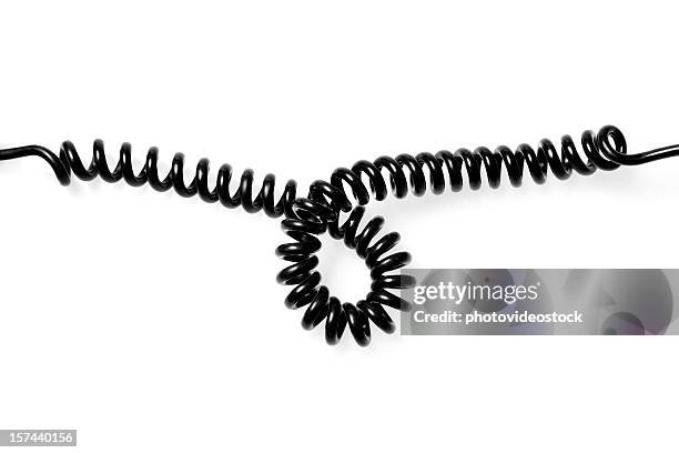 looped telephone wire - curling stock pictures, royalty-free photos & images