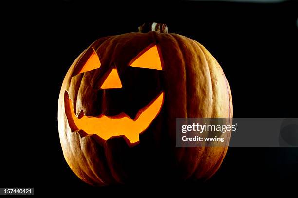 jack o'lantern bei nacht - jack o lantern stock-fotos und bilder