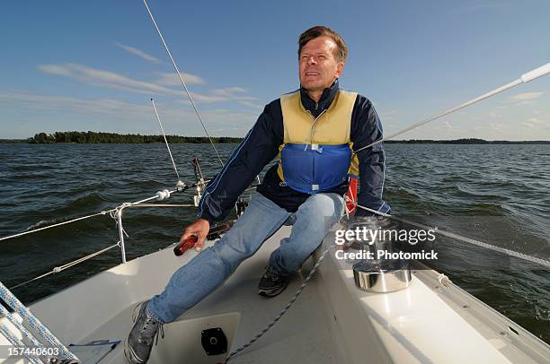 at the helm - archipelago stock pictures, royalty-free photos & images