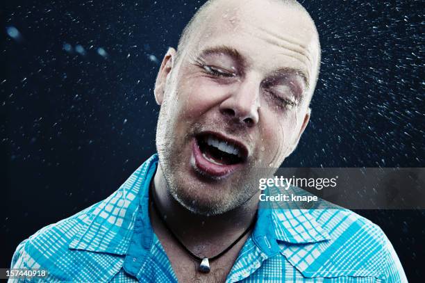 splashing water - man splashed with colour stock pictures, royalty-free photos & images