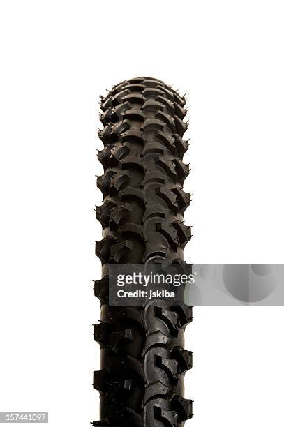 vertical macro of a mountain bike tire tread and nubs - bicycle tire stockfoto's en -beelden