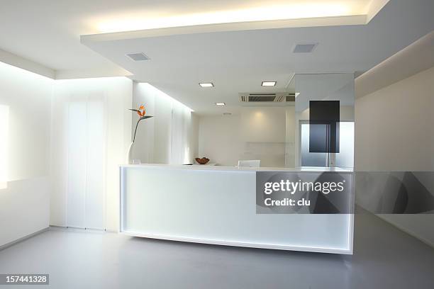 modern reception desk in grey white color (xxxl) - funky office stock pictures, royalty-free photos & images