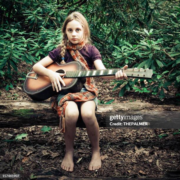 indie girl playing the guitar - girl barefoot stock pictures, royalty-free photos & images