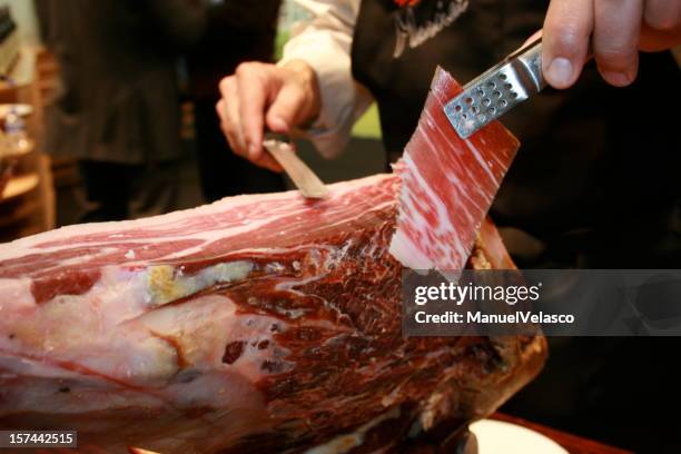 cutting ham - jamón serrano stock pictures, royalty-free photos & images