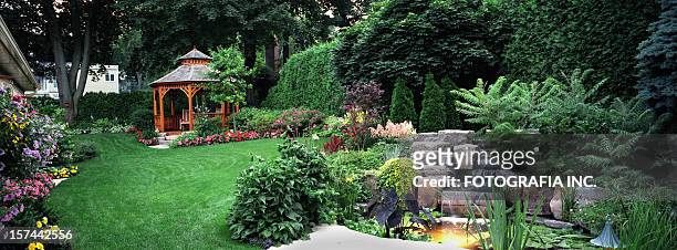 garden at night - landscaped stock pictures, royalty-free photos & images