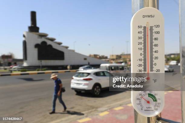Photo shows a thermometer reaching 50 degrees Celsius as daily life negatively impacted by extreme heat in the capital city Baghdad, Iraq on August...