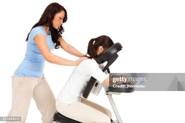 massage im massagestuhl - massagestuhl stock-fotos und bilder