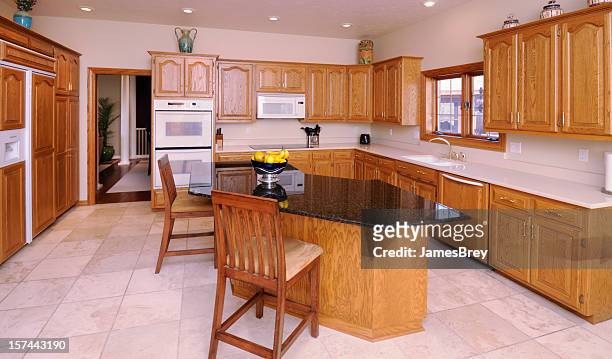 modern kitchen with hardwood cabinetry - the oak room stock pictures, royalty-free photos & images