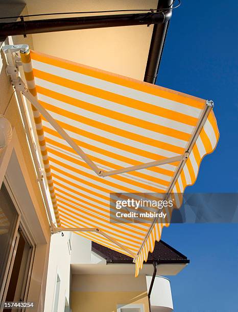 awning - striped awning stock pictures, royalty-free photos & images