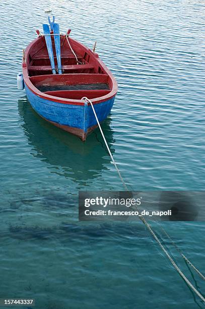 fishing rowboat in little port of giovinazzo, apulia (southern italy) - giovinazzo stock pictures, royalty-free photos & images