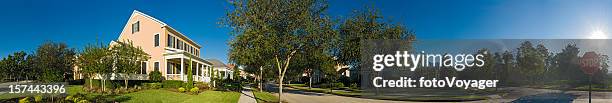 suburban street sunrise stop sign - panoramic home stock pictures, royalty-free photos & images