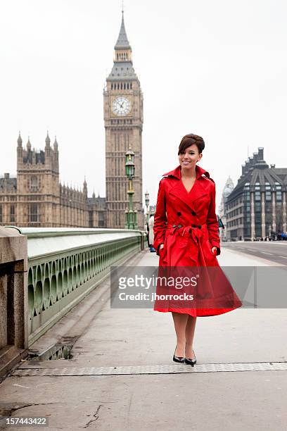 london woman in red - trench coat stock pictures, royalty-free photos & images