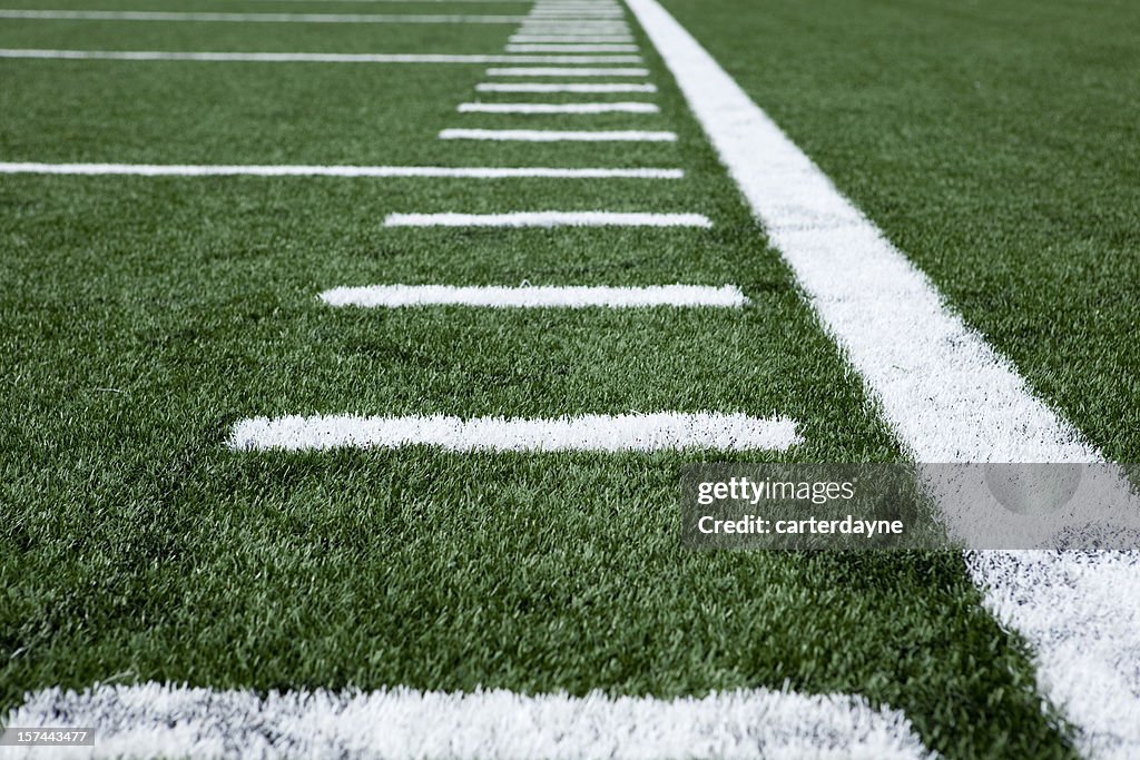 Close up football stadium artificial grass and markings