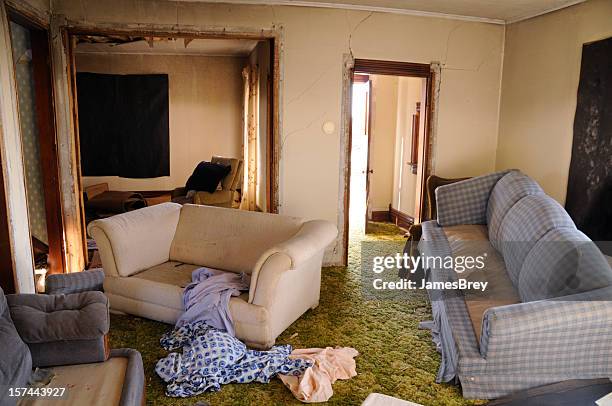 destroyed home; damaged by looting, earth quake, or flooding - earthquake house stock pictures, royalty-free photos & images