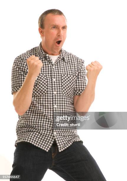 erhalten sie in - faust in die luft stoßen stock-fotos und bilder