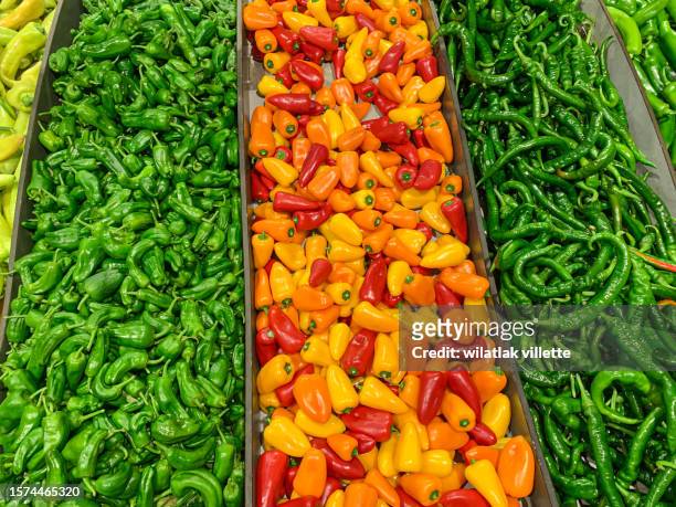 green and red pepper background, - cannes food stock pictures, royalty-free photos & images