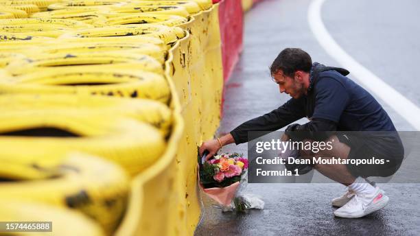 Pierre Gasly of France and Alpine F1 lays a wreath in tribute to the late Anthoine Hubert during previews ahead of the F1 Grand Prix of Belgium at...