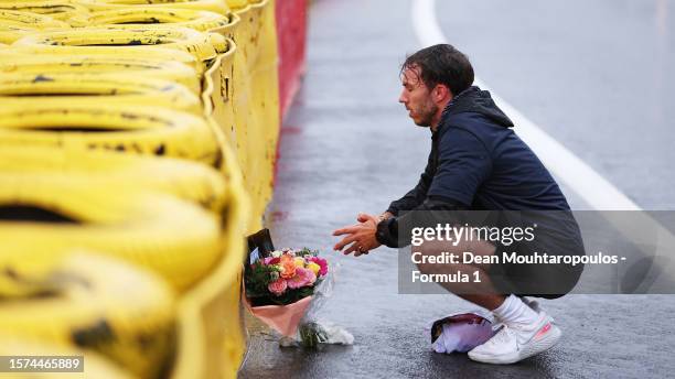 Pierre Gasly of France and Alpine F1 lays a wreath in tribute to the late Anthoine Hubert during previews ahead of the F1 Grand Prix of Belgium at...