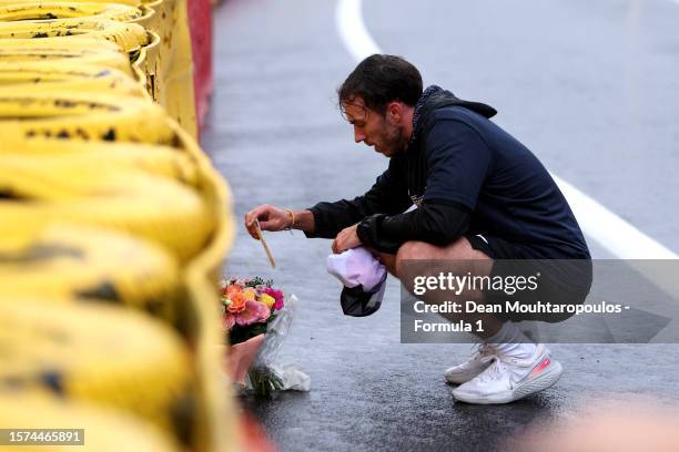 Pierre Gasly of France and Alpine F1 lays a wreath in tribute to the late Anthoine Hubert during previews ahead of the F1 Grand Prix of Belgium at...