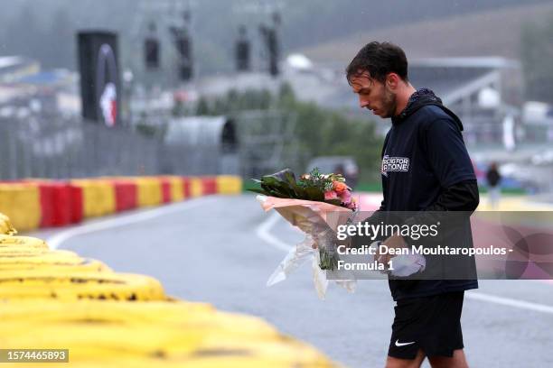 Pierre Gasly of France and Alpine F1 lays a wreath in tribute to the late Anthoine Hubert during previews ahead of the F1 Grand Prix of Belgium at...