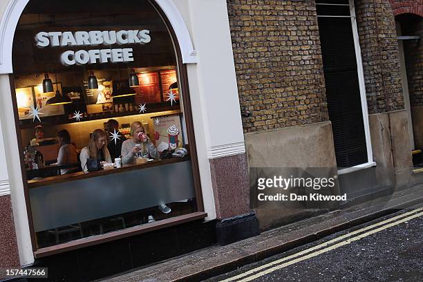 General view of a Starbucks coffee shop on December 3, 2012 in London, England. The coffee chain has announced that it is looking to pay more tax...