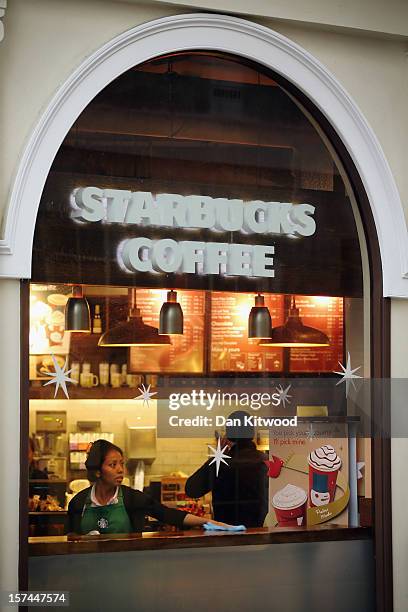 General view of a Starbucks coffee shop on December 3, 2012 in London, England. The coffee chain has announced that it is looking to declare larger...