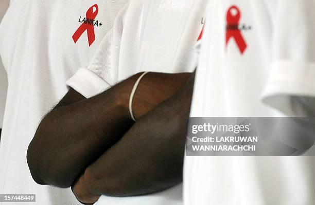 Sri Lankan volunteers take part in a meeting to mark World AIDS Day in Colombo on December 1, 2009. Some 1,161 HIV positive cases have been...