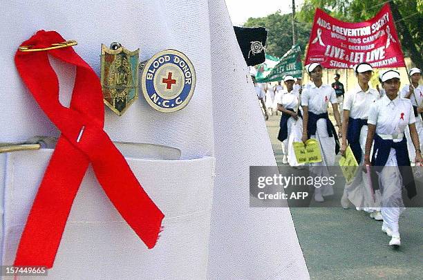 Cadets take part in a rally organized by the Assam State AIDS Control Society in Guwahati, 01 December 2002 on the occasion of the World Aids Day....