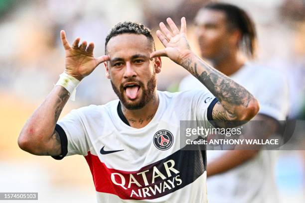 Paris Saint-Germain's Neymar celebrates after scoring a goal against Jeonbuk Hyundai Motors during their friendly football match at the Asiad Main...