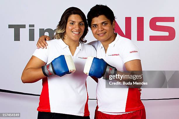 Ana Marcela and Adriana Araujo pose for a picture during the presentation of Team Nissan for Rio de Janeiro Olympics Games 2016 at Cine Lagoon on...