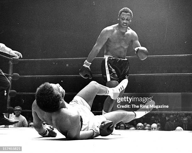 Joe Frazier looks on as he knocks out Jimmy Ellis at the Madison Square Garden, on February 16,1970 in New York, New York. Joe Frazier won the vacant...