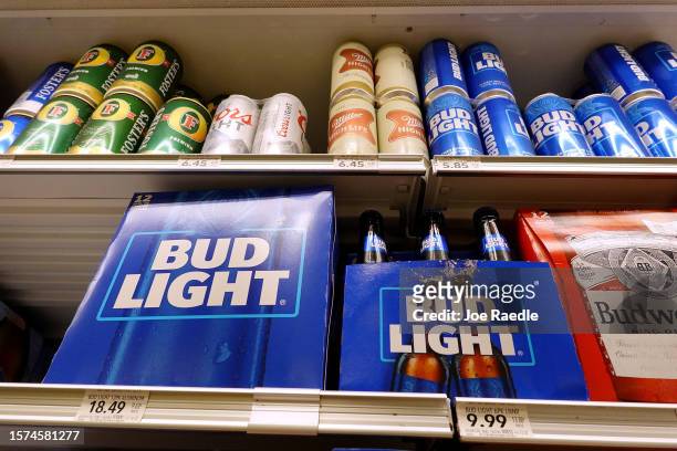Bud Light, made by Anheuser-Busch, sits on a store shelf on July 27, 2023 in Miami, Florida. Anheuser-Busch InBev announced it will lay off hundreds...