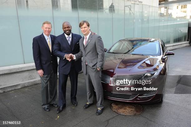 President and Chief Executive Officer of the Ford Motor Company Alan Mulally, Emmitt Smith and GVP, Marketing & Sales at Ford Motor Company Jim...