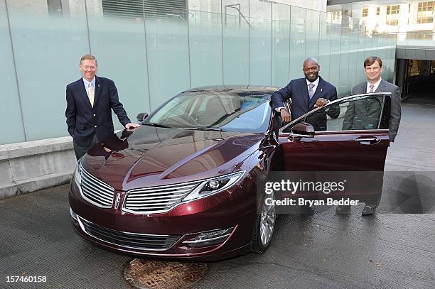 President and Chief Executive Officer of the Ford Motor Company Alan Mulally, Emmitt Smith and GVP, Marketing & Sales at Ford Motor Company Jim...