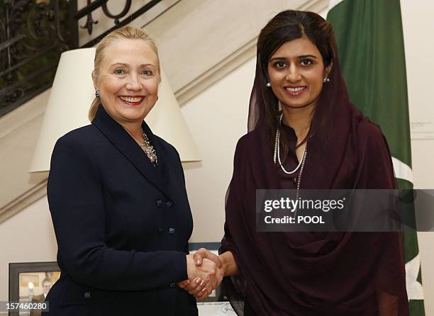 Secretary of State Hillary Clinton meets with Pakistan's Foreign Minister Hina Rabbani Khar in the residence of the U.S. Ambassador to Belgium, in...