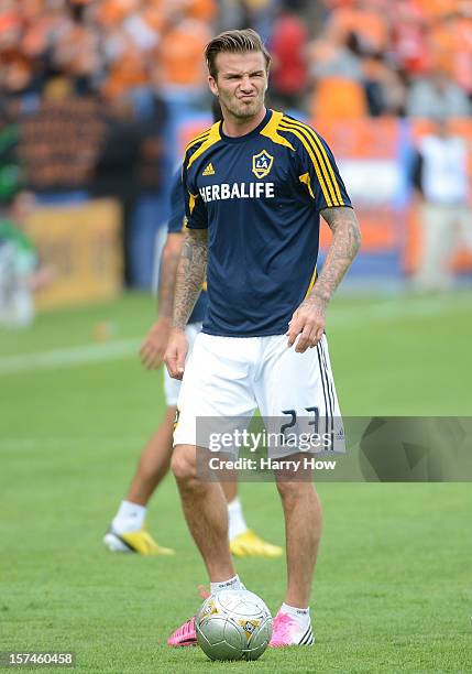 David Beckham of Los Angeles Galaxy warms up before taking on the Houston Dynamo in the 2012 MLS Cup at The Home Depot Center on December 1, 2012 in...