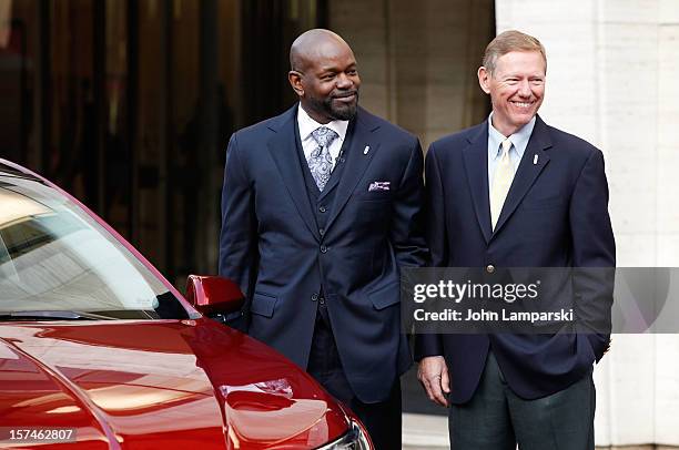Lincoln Motor Company Ambassador Emmitt Smith and President and CEO of Ford Motor Company Alan Mulally attend Ford Lincoln Unveils New Brand...