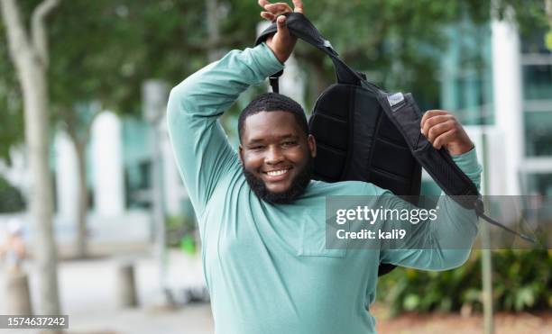 Carrying Rucksack Carrying A Heavy Backpack Photos and Premium High Res Pictures - Getty ...