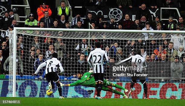 Wigan keeper Ali Al-Habsi is beaten by Demba Ba for Newcastle's first goal during the Barclays Premier League match between Newcastle United and...