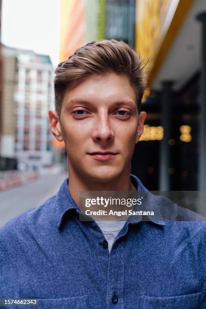 detailed portrait of a blond young man in the city - fashion man single casual shirt stock pictures, royalty-free photos & images