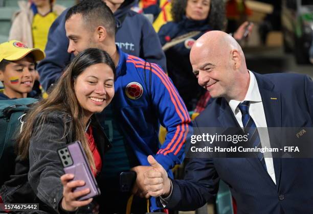 President Gianni Infantino takes selfie with fan after the FIFA Women's World Cup Australia & New Zealand 2023 Group H match between Morocco and...