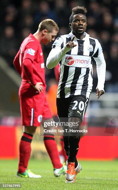 Gael Bigirimana celebrates scoring the third goal during the Barclays Premier League match between Newcastle United and Wigan Athletic at St James'...