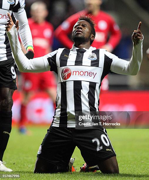 Gael Bigirimana celebrates scoring the third goal during the Barclays Premier League match between Newcastle United and Wigan Athletic at St James'...