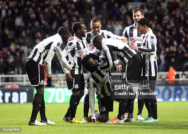 Gael Bigirimana celebrates scoring the third goal during the Barclays Premier League match between Newcastle United and Wigan Athletic at St James'...